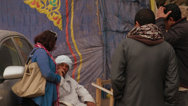 Sherine Hamdy speaks to a bawab in Maadi, January 2016. Photo taken by Francesco Dragone.